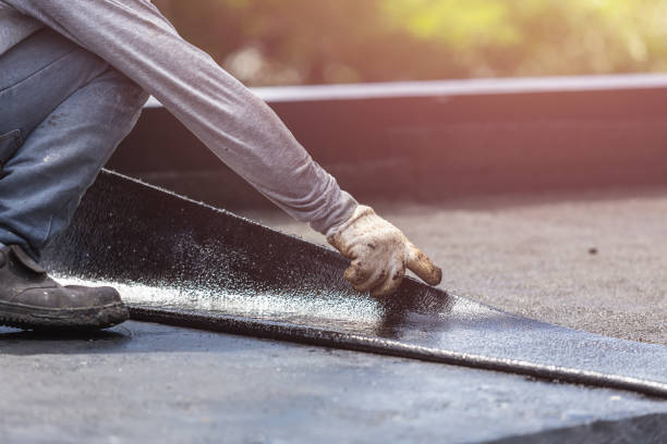 Professional Basement Waterproofing technician working in Rives Junction, MI